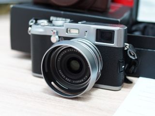 Fujifilm FinePix X100 12.3 MP Digital Camera with extras