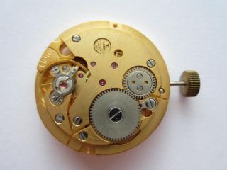   cal 2541 N.O.S. swiss gents watch movement   runs and keeps time