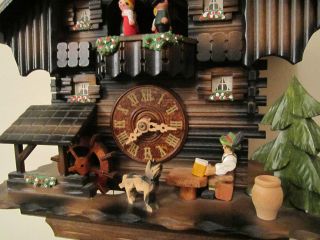 Musical Chalet Cuckoo Clock with Animated Beer Drinker