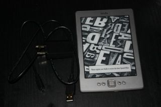   Kindle E Ink D01100 (4th Generation) eBook/eReader 2GB with books Grey
