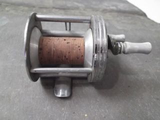   Bronson Mercury Casting Reel With Cork Center and Etched Fishing Scene