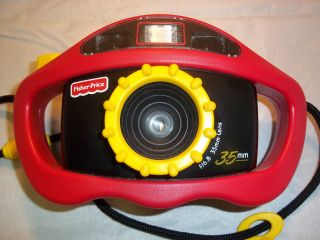 VINTAGE FISHER PRICE 35 MM FILM CAMERA WITH STRAP & ATTACHED PLASTIC 