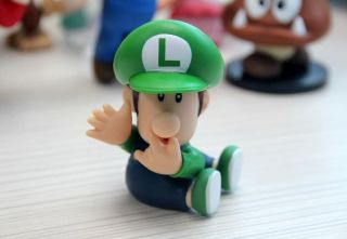New Super Mario Bros 3 Luigi baby Action Figure Toy