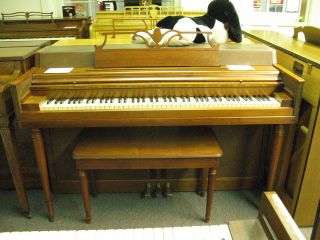 Wurlitzer spinet piano in Piano