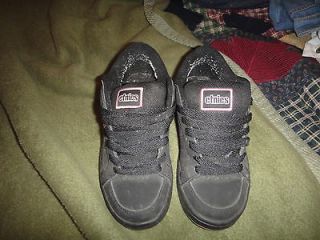 Etnies pink and black shoes size 6