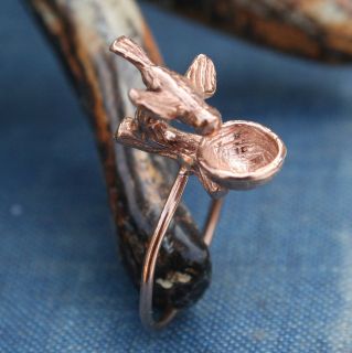 This is such a cute ring Sterling silver, gold plated bird flying 