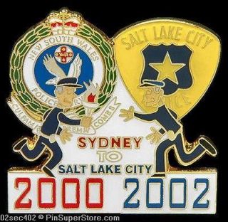 BADGE PIN OLYMPIC 2002 SALT LAKE SECURITY TORCH SYDNEY 2000