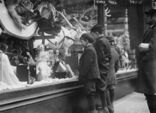 early 1900s photo Children looking at Xmas toys in shop window Vintage 