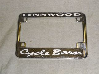 Lynwood CA Cycle Barn motorcycle license plate frame embossed metal 