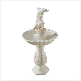 newly listed dolphin and waves water fountain 