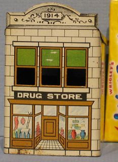 1914 tin village drug store building candy container t223 time