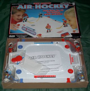 Air Hockey Cordless Puck Rides on Air with 4 Hockey Players A Must 