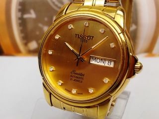 Tissot 1853 Seastar Day Date Plated Automatic Mens Watch Gold Dial 