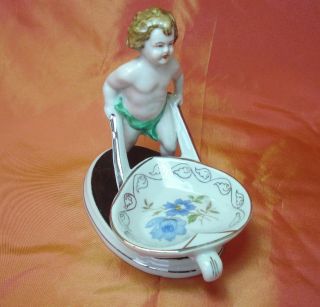 1920s antique porcelain figurine boy one wheelbarrow