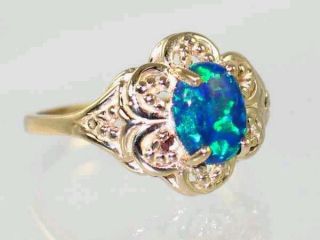 The stone is a unique Created Blue/ Green Opal; Bright Green Opal 