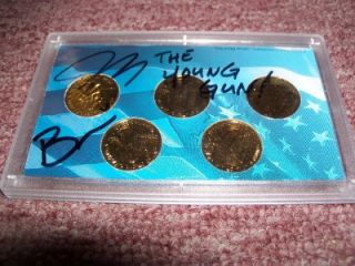 UNCIRCULATED COINS SIGNED BY JARROD AND BRANDI OF STORAGE WARS