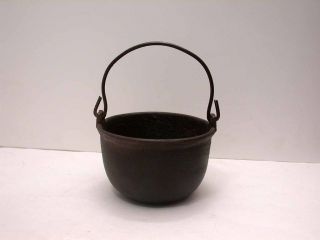 original small antique cast iron kettle with wrought handle time