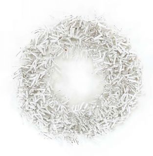 This artificial Christmas wreath is a faux twig base with heavy white 