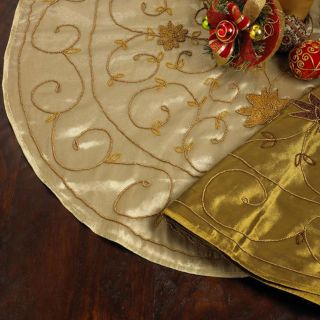  tree skirt. This tree skirt showcases an hand beaded floral pattern