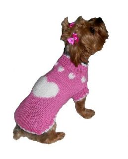 To properly fit your dog for a sweater, measure from the base of the