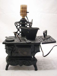 VINTAGE CAST IRON TOY COAL STOVE TOP ELECTRIC LAMP W ACCESSORIES