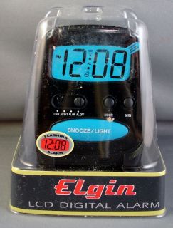 Elgin 3502E Travel Alarm Clock with Red Flashing Alarm 7 LCD Uses AAA