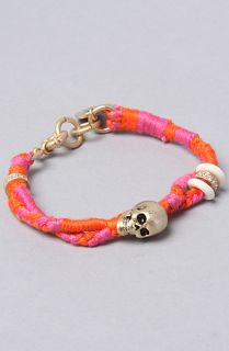 Disney Couture Jewelry The Pirates Braided Skull Bracelet in Pink and