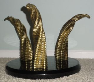 Maison Jansen solid brass sculptural rams horn lacquer base glass top