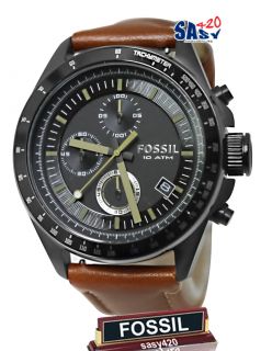  black stainless steel dial with green hour markers brown leather strap