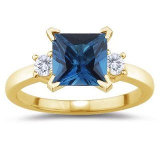 10 Cts Diamond & 0.69 Cts London Blue Topaz Ring in 18K Yellow Gold
