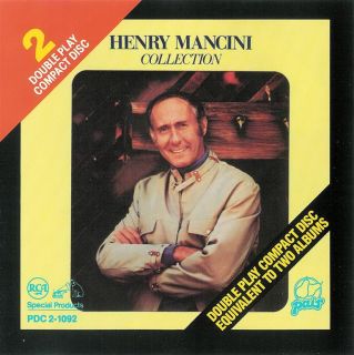 used cd in like new condition henry mancini collection pictures below