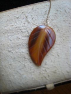jami rodriquez burnished wood, heart, & leaf assymetrical gold chain