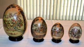 Set of four oriental decorative eggs China hand painted Satsuma
