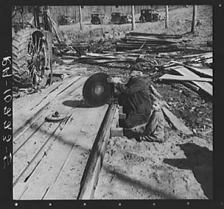 Photo Sighting a circular saw blade at country sawmill near Omaha