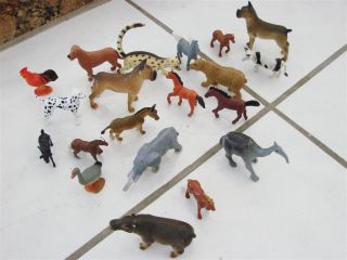 Lot of plastic vinyl animals anteater, bull dogs horses,farm, dogs