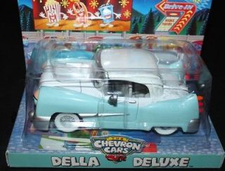 Chevron toy car: Della Deluxe, MIB, 2001. Rare, eyes move, doors