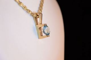 Natural Blue Zircon set in 14 KY Gold Pendant
