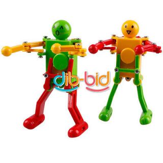 Red Yellow Green Clockwork Spring Wind Up Dancing Robot Children Kids