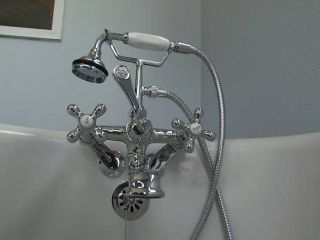 Clawfoot faucet with hand spray with Elephant spout