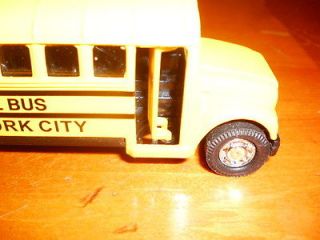 small new york city school bus diecast toy,used,rollb ack/loose.