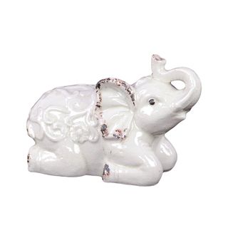 White Ceramic Elephant (WhiteDimensions: 7.5 inches high x 11 inches wide x 5.5 inches deep CeramicColor: WhiteDimensions: 7.5 inches high x 11 inches wide x 5.5 inches deep)
